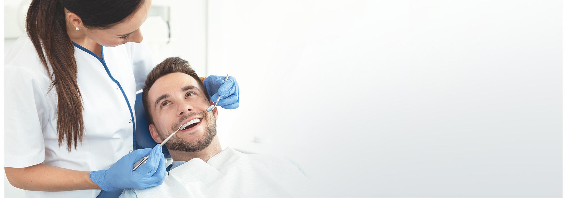 Slajd #1 - dentysta i pacjent